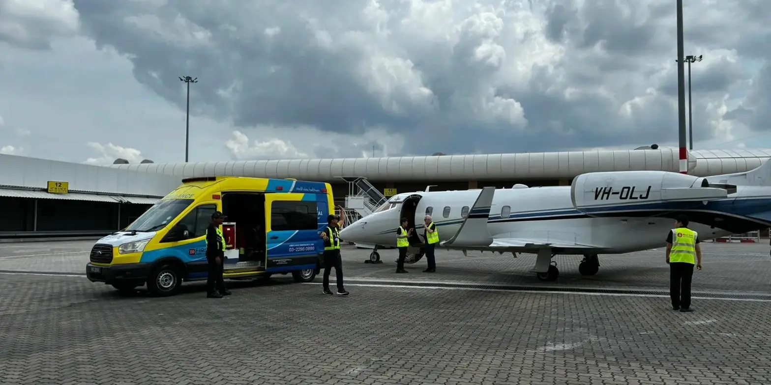 Red Dot Air Ambulance Bombardier Learjet 60 on the tarmac at Seletar Airport, Singapore